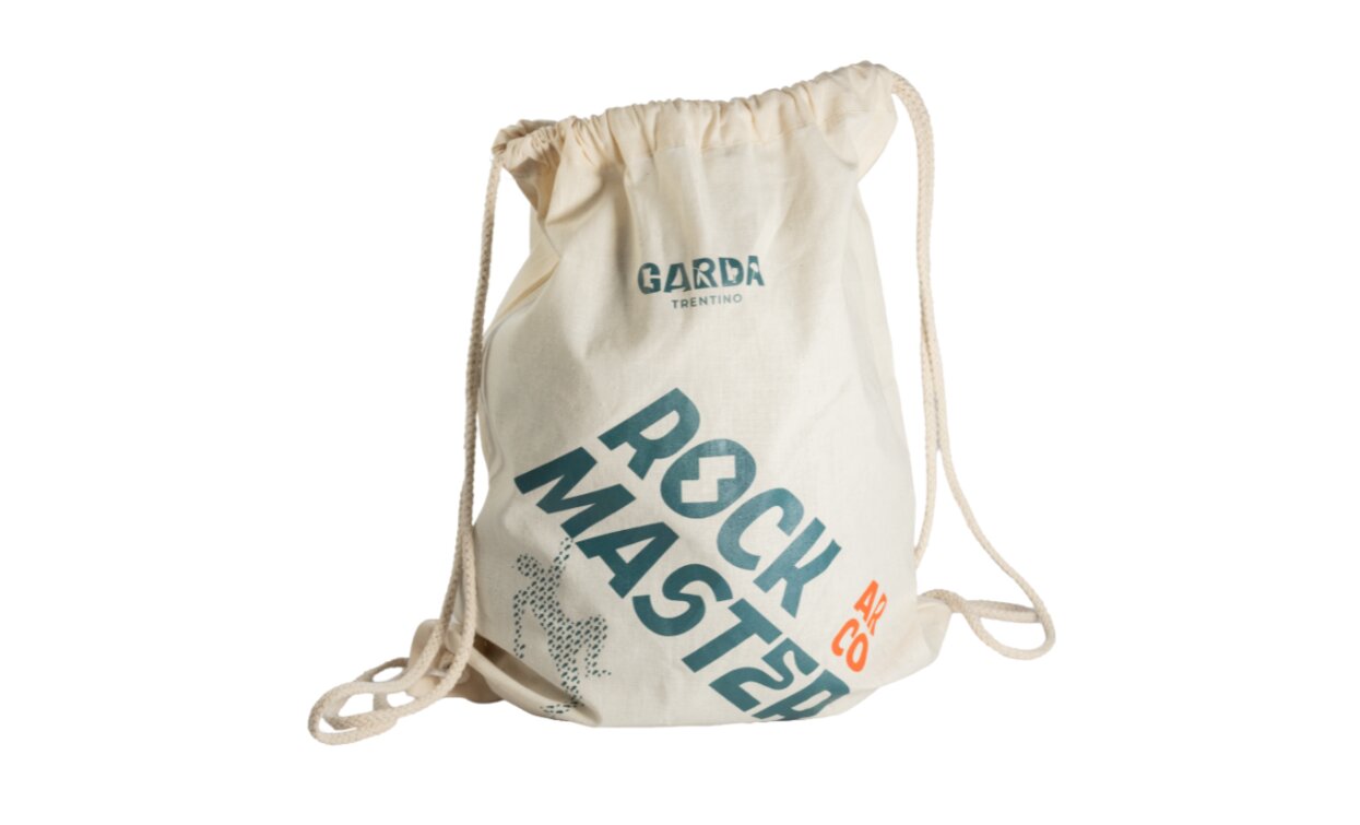 A canvas bag with a drawstring closure.  
It features the "ROCK MASTER" logo and the writing "GARDA TRENTINO".
